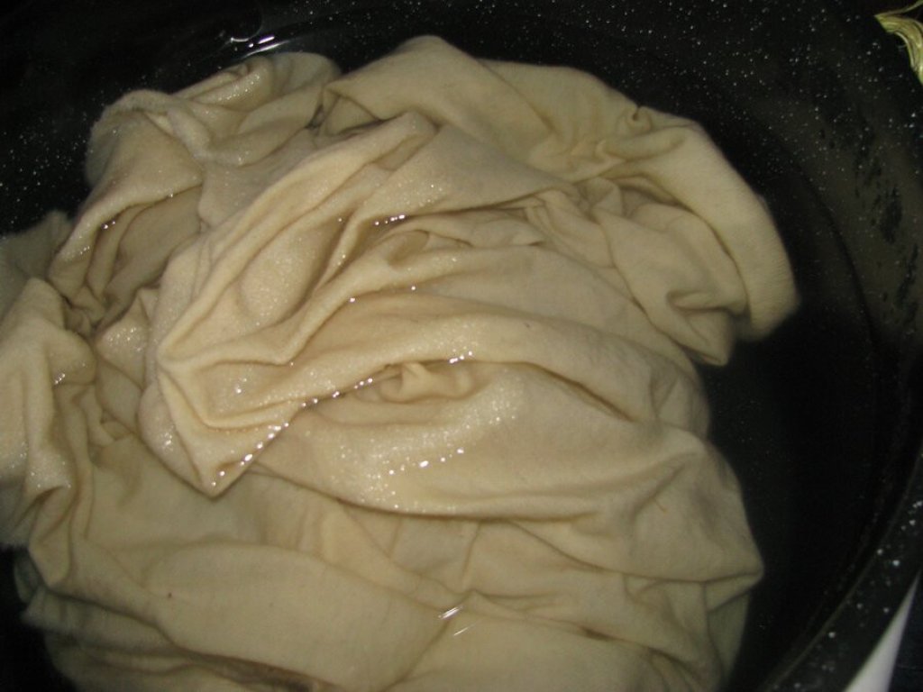 Allow the fabric to soak in the mordant solution for several days.