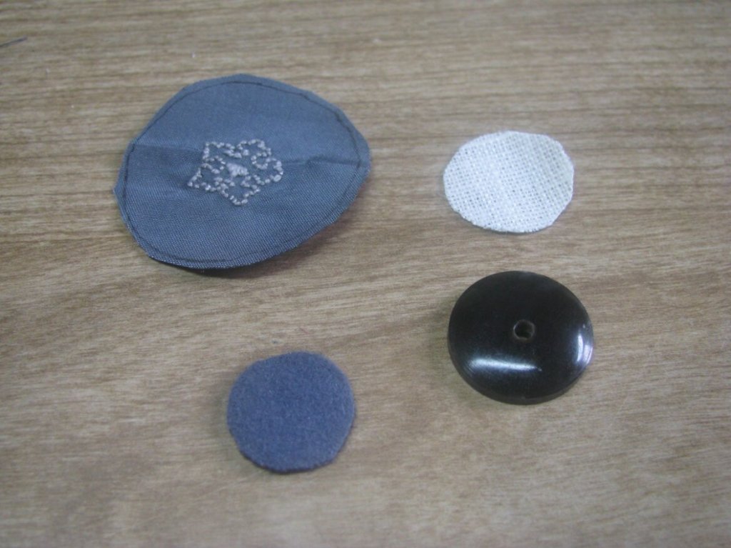 Covered button pieces.